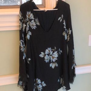 Free People dress. V neck with open back slits